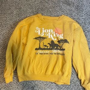 Women’s The Lion King Crew Neck Sweater. Medium